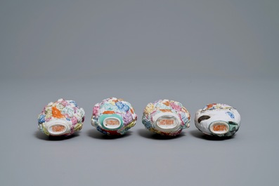 Four Chinese famille rose porcelain relief-decorated snuff bottles, 19th C.